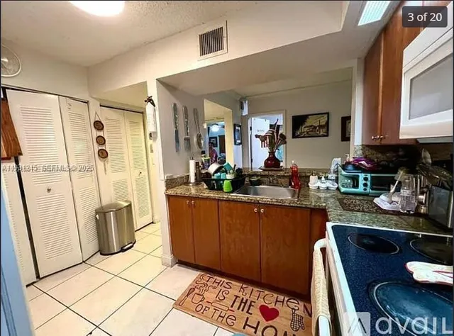 a room with patio furniture and windows