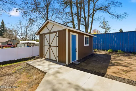 a view of backyard of house