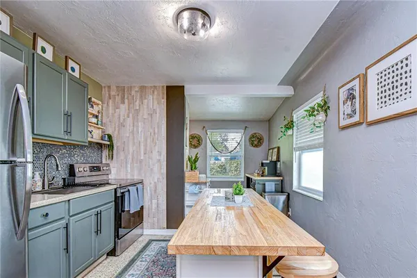 a view of kitchen and windows