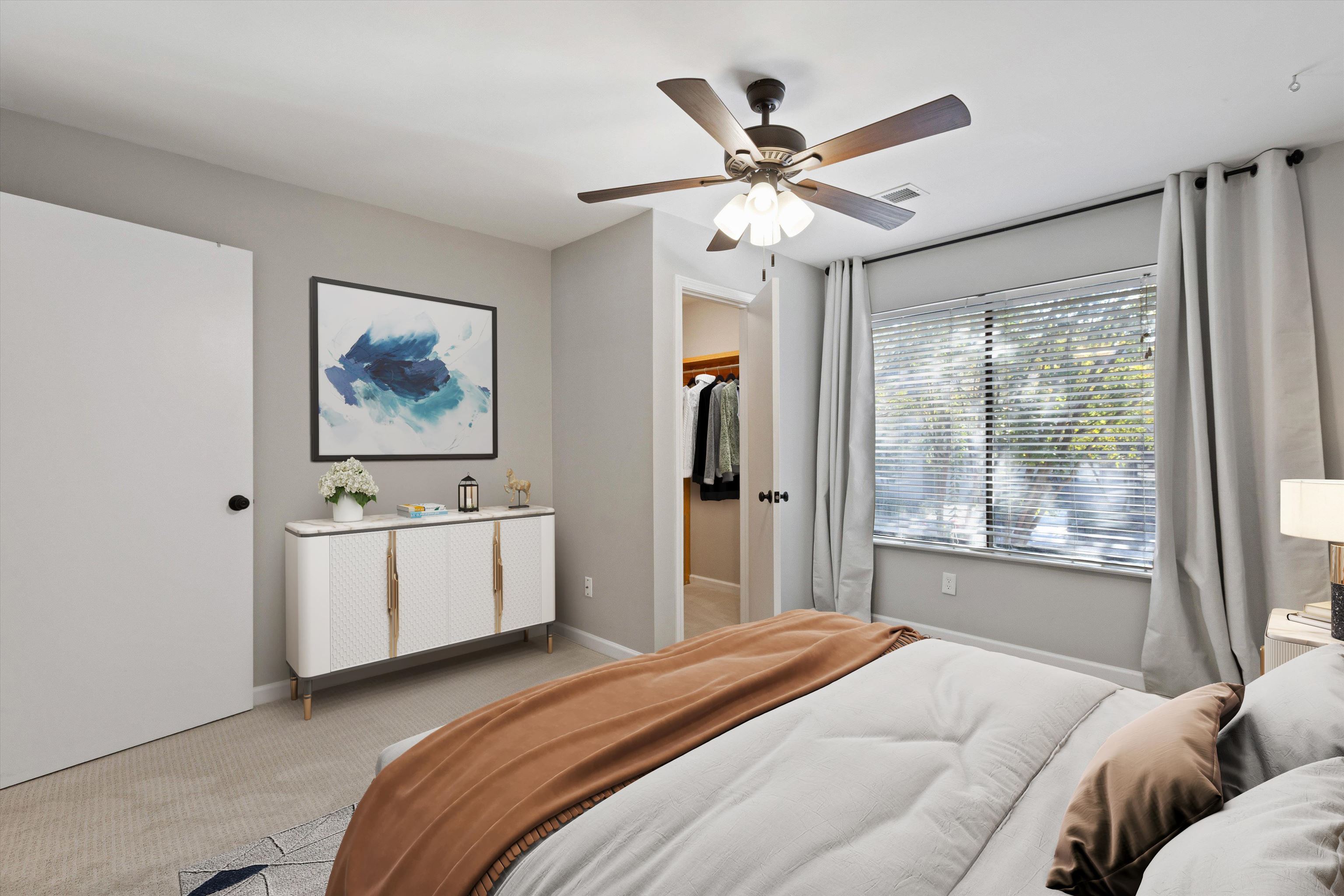 1806 Birch Post Cove, Unit 118 Germantown, TN 38138 - Photo 13 of 25 a bedroom with a large bed and a chandelier