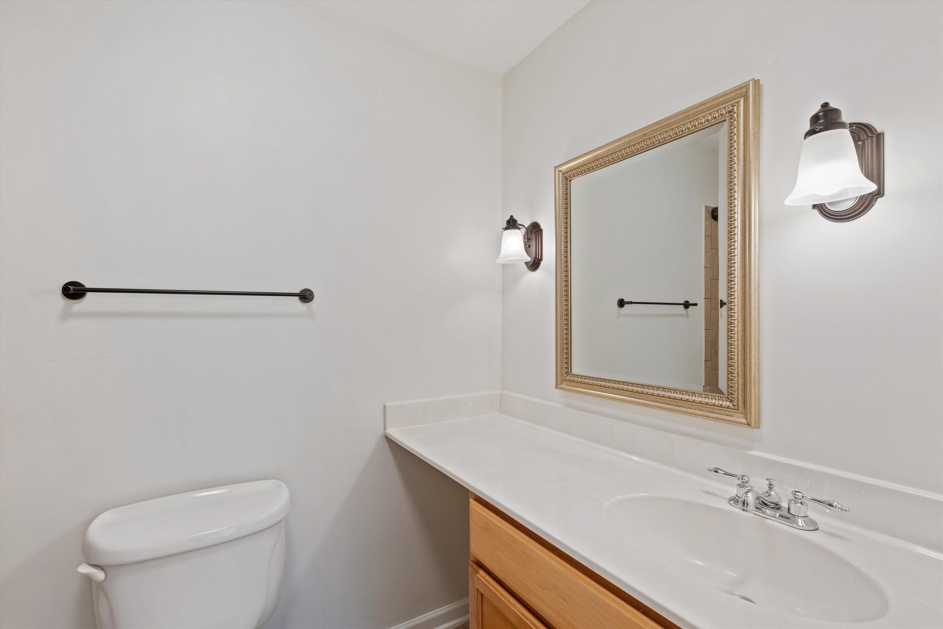 1806 Birch Post Cove, Unit 118 Germantown, TN 38138 - Photo 14 of 25 a bathroom with a sink toilet and vanity