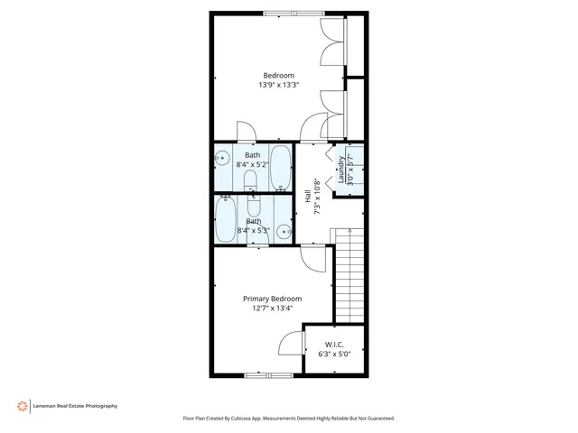 a picture of a bench in front of a wall