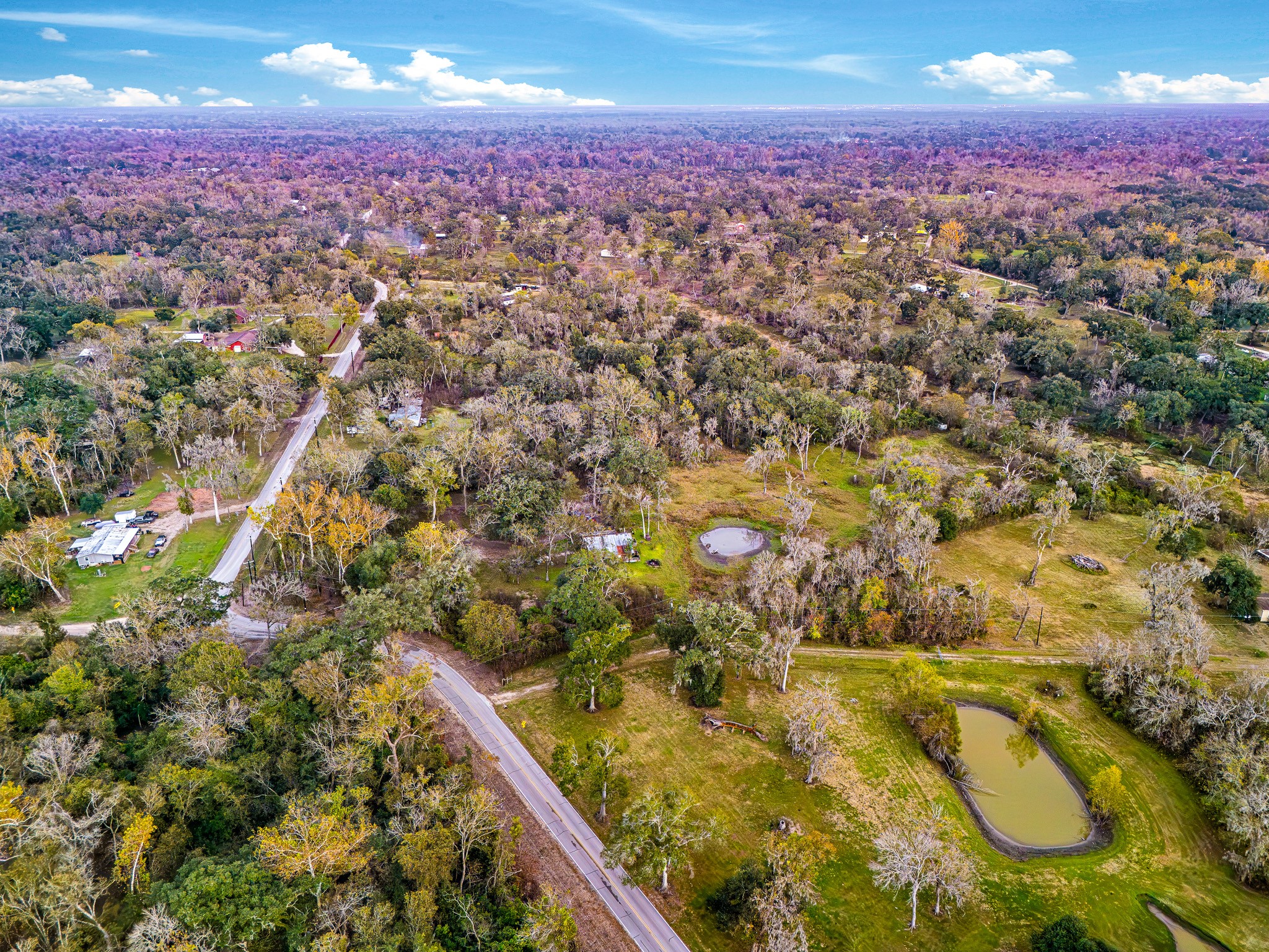 209 River Road Angleton, TX 77515 - Photo 21 of 38 a view of city and swimming pool