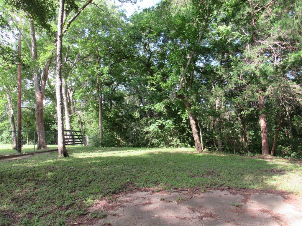 9491 Rocky Road Bellville, TX 77418 - Photo 11 of 19 a view of a park with large trees