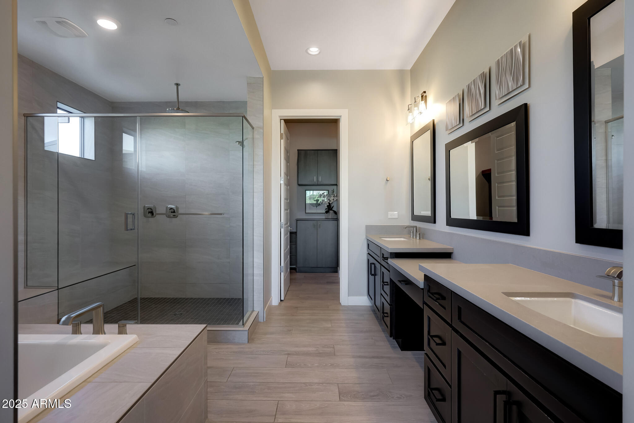 13018 East Juan Tabo Road Scottsdale, AZ 85255 - Photo 24 of 72 a bathroom with a sink double vanity granite tub shower and a mirror