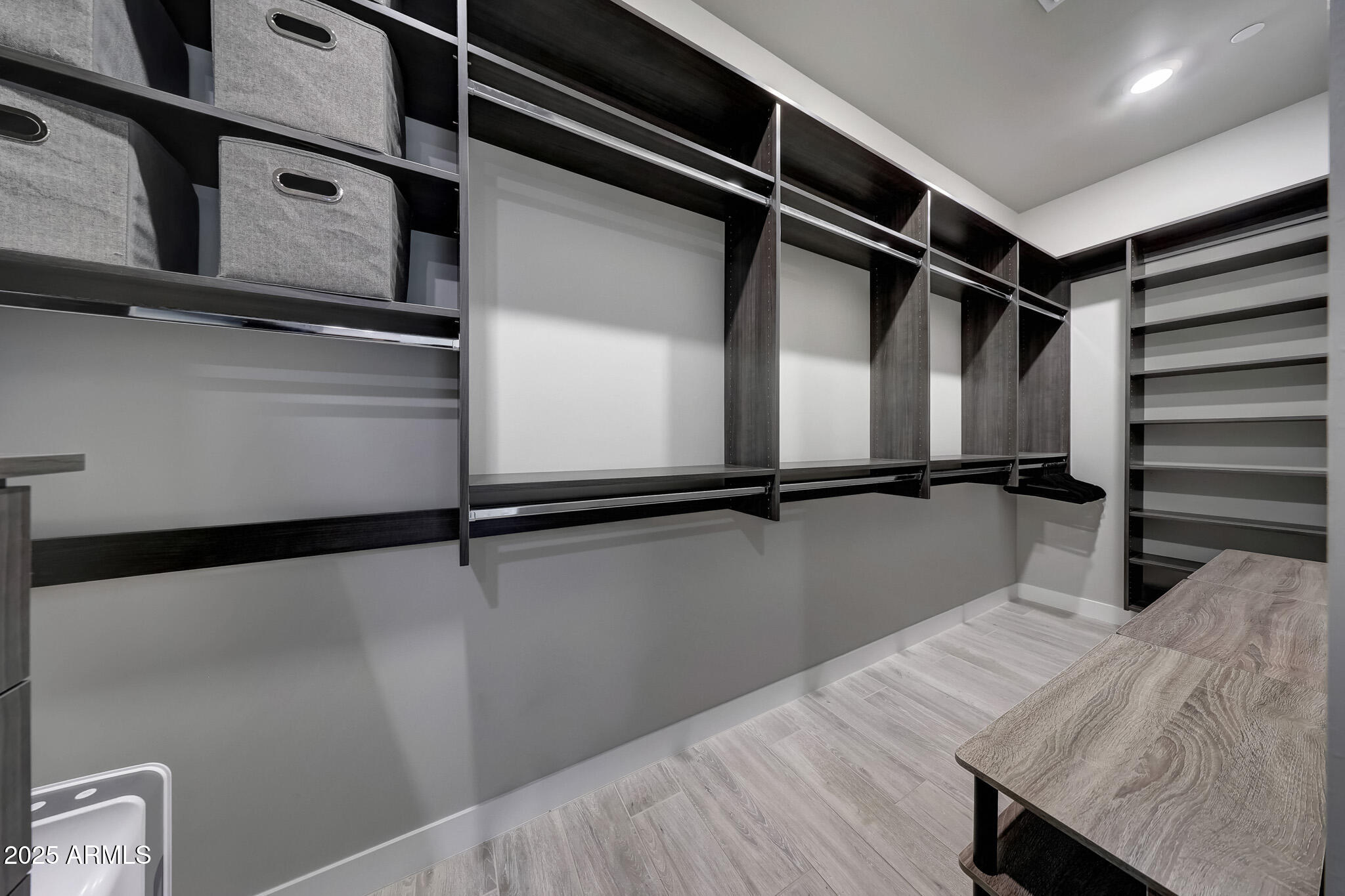 13018 East Juan Tabo Road Scottsdale, AZ 85255 - Photo 26 of 72 a view of a room with racks on the wall
