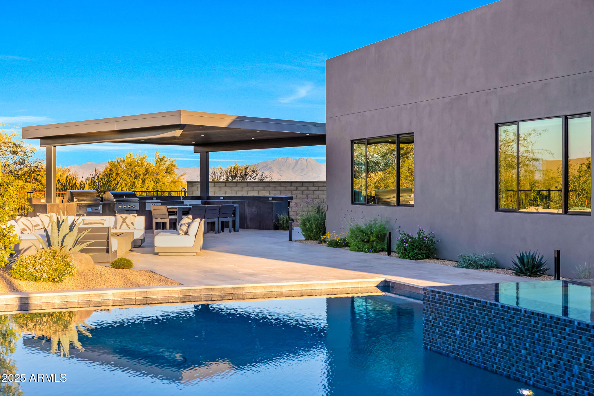 13018 East Juan Tabo Road Scottsdale, AZ 85255 - Photo 60 of 72 a view of swimming pool with outdoor seating
