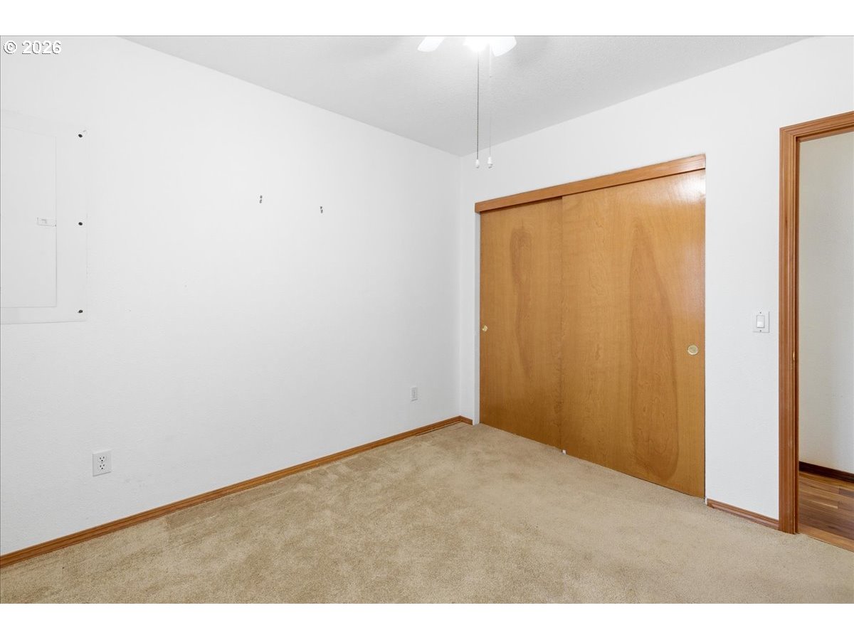142 South Quadrant Street Rockaway Beach, OR 97136 - Photo 20 of 42 a view of an empty room