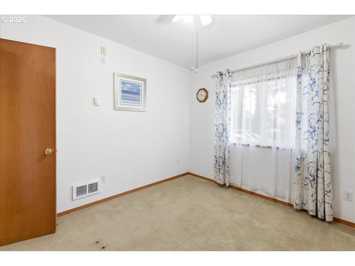 142 South Quadrant Street Rockaway Beach, OR 97136 - Photo 22 of 42 a view of an empty room