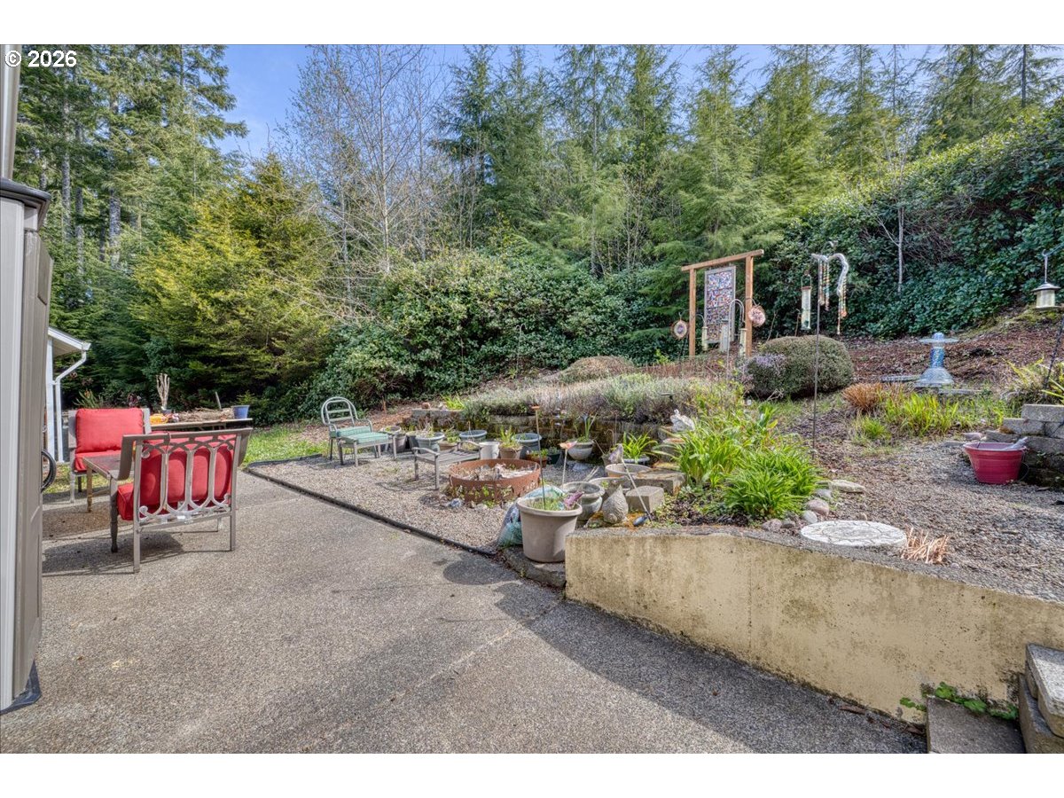 142 South Quadrant Street Rockaway Beach, OR 97136 - Photo 33 of 42 a view of outdoor space patio and lake view
