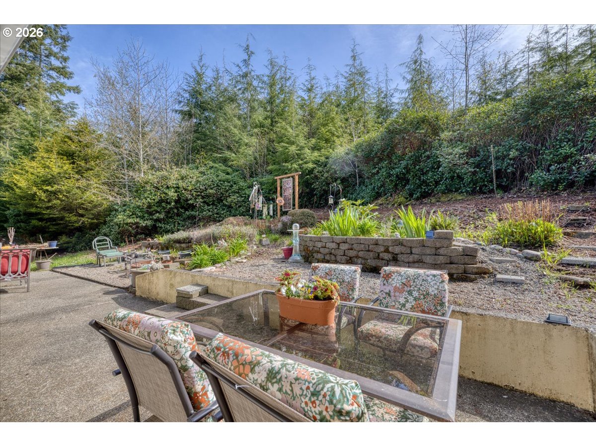 142 South Quadrant Street Rockaway Beach, OR 97136 - Photo 37 of 42 a view of yard with outdoor seating