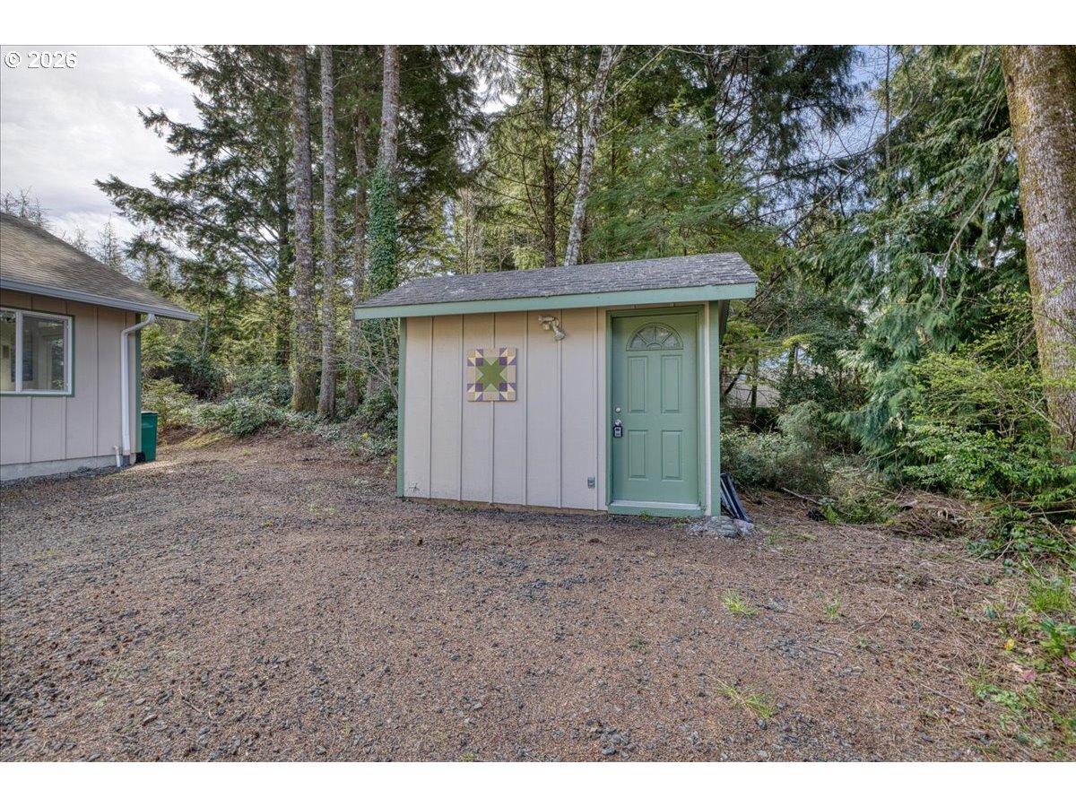 142 South Quadrant Street Rockaway Beach, OR 97136 - Photo 39 of 42 a view of a backyard