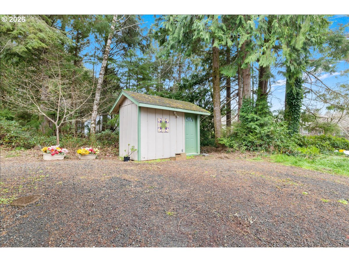 142 South Quadrant Street Rockaway Beach, OR 97136 - Photo 42 of 42 a view of a house with a outdoor space