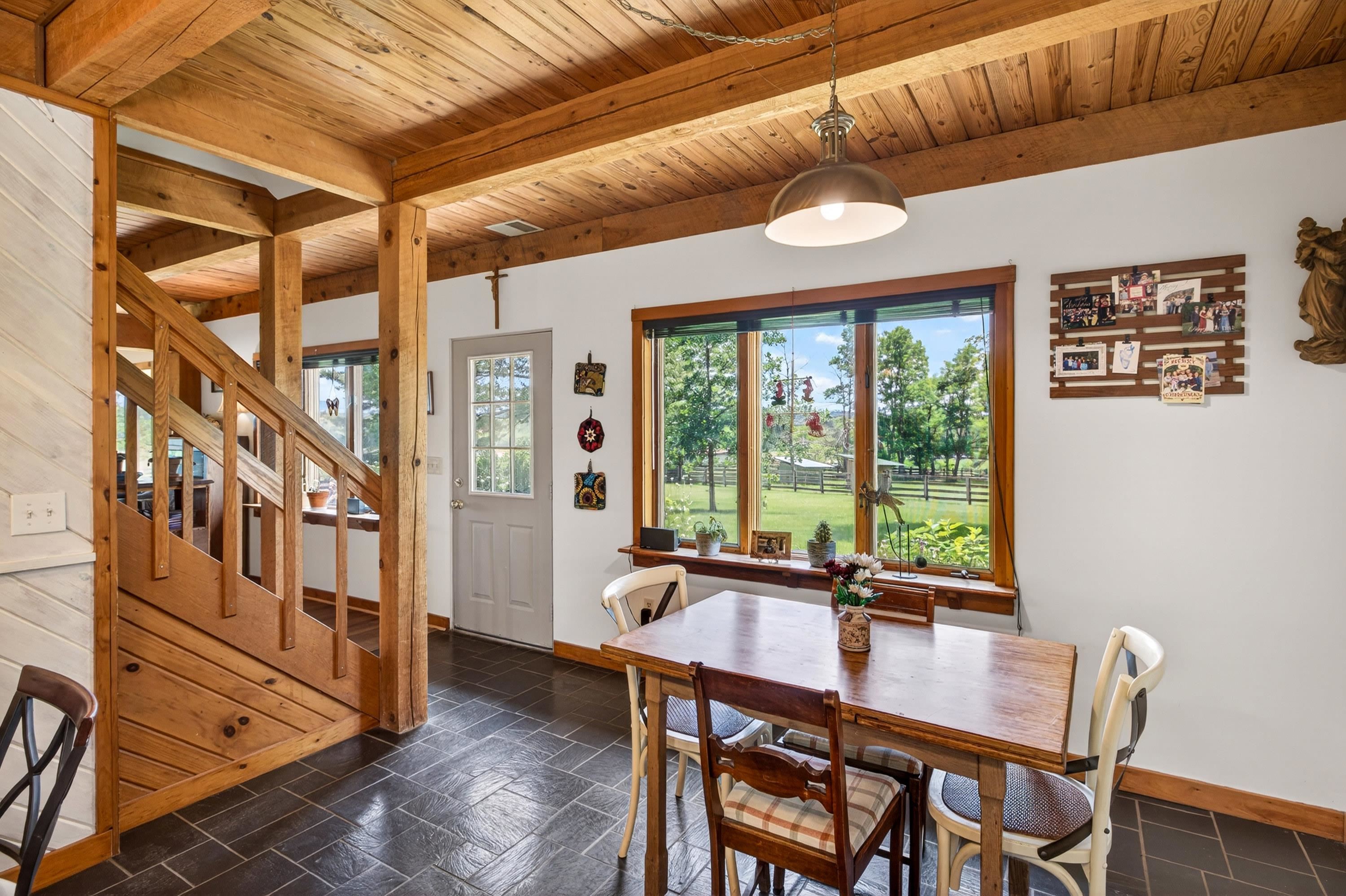 3980 Greenmount Road Harrisonburg, VA 22802 - Photo 27 of 75 The kitchen offers an eat-in dining area, white wooden cabinetry, large windows, and an abundance of cabinetry for storage. This home features stainless steel appliance and many more upgrades!