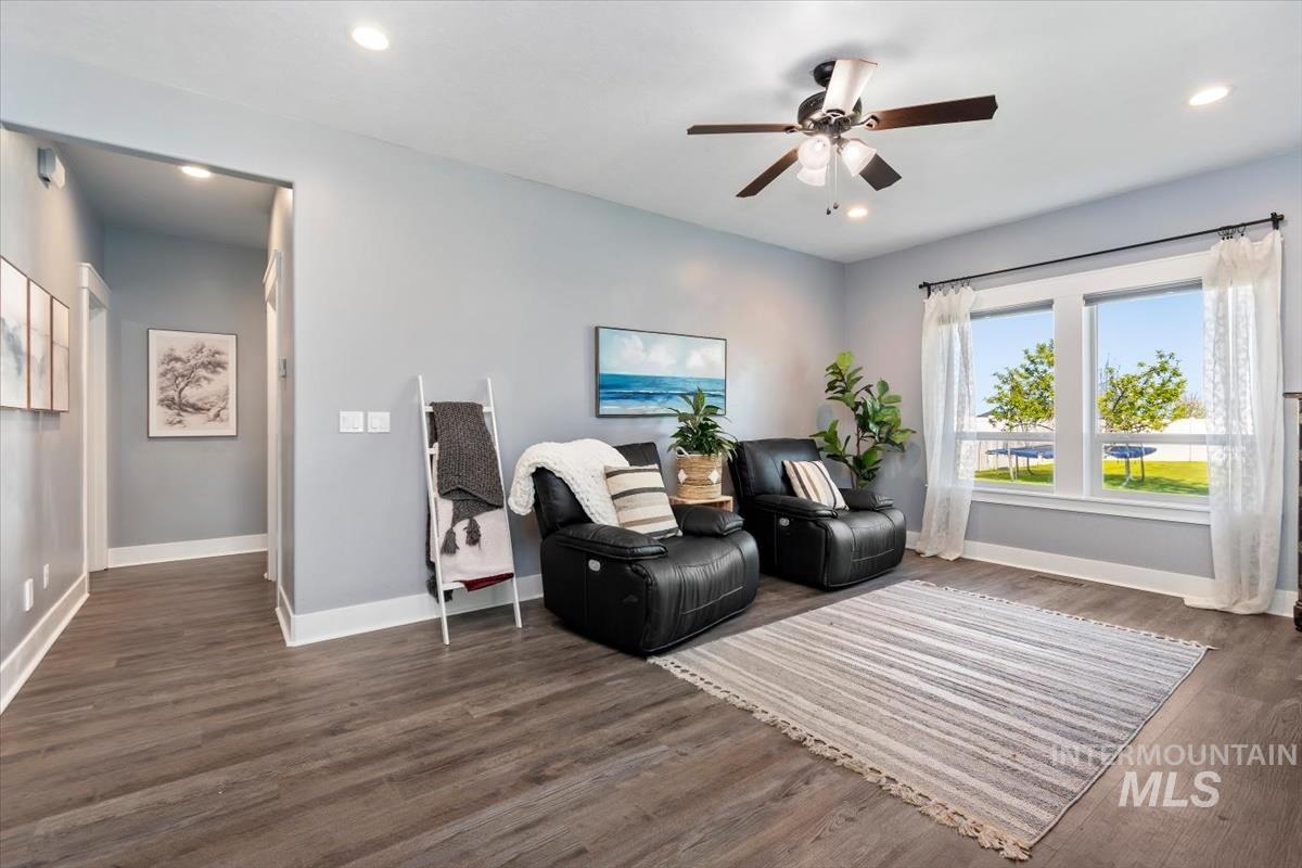 15015 Leon Lane Caldwell, ID 83607 - Photo 27 of 44 Spacious room featuring wood-finish flooring, recessed lighting, and a ceiling fan