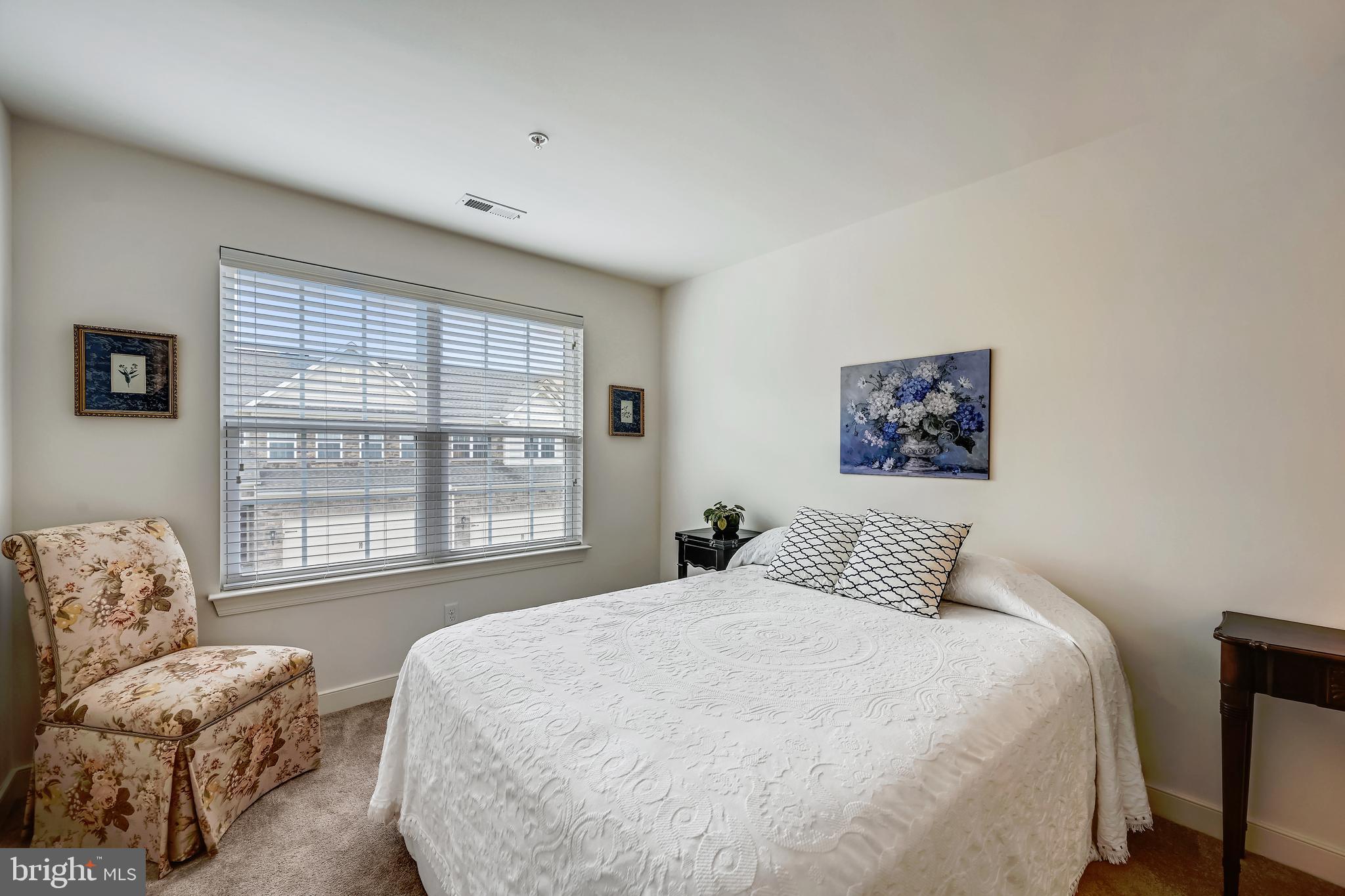 24 Trail Ride Drive, Unit 435 Taneytown, MD 21787 - Photo 25 of 61 BEDROOM #2 W/ WINDOWS LETTING IN NATURAL LIGHT