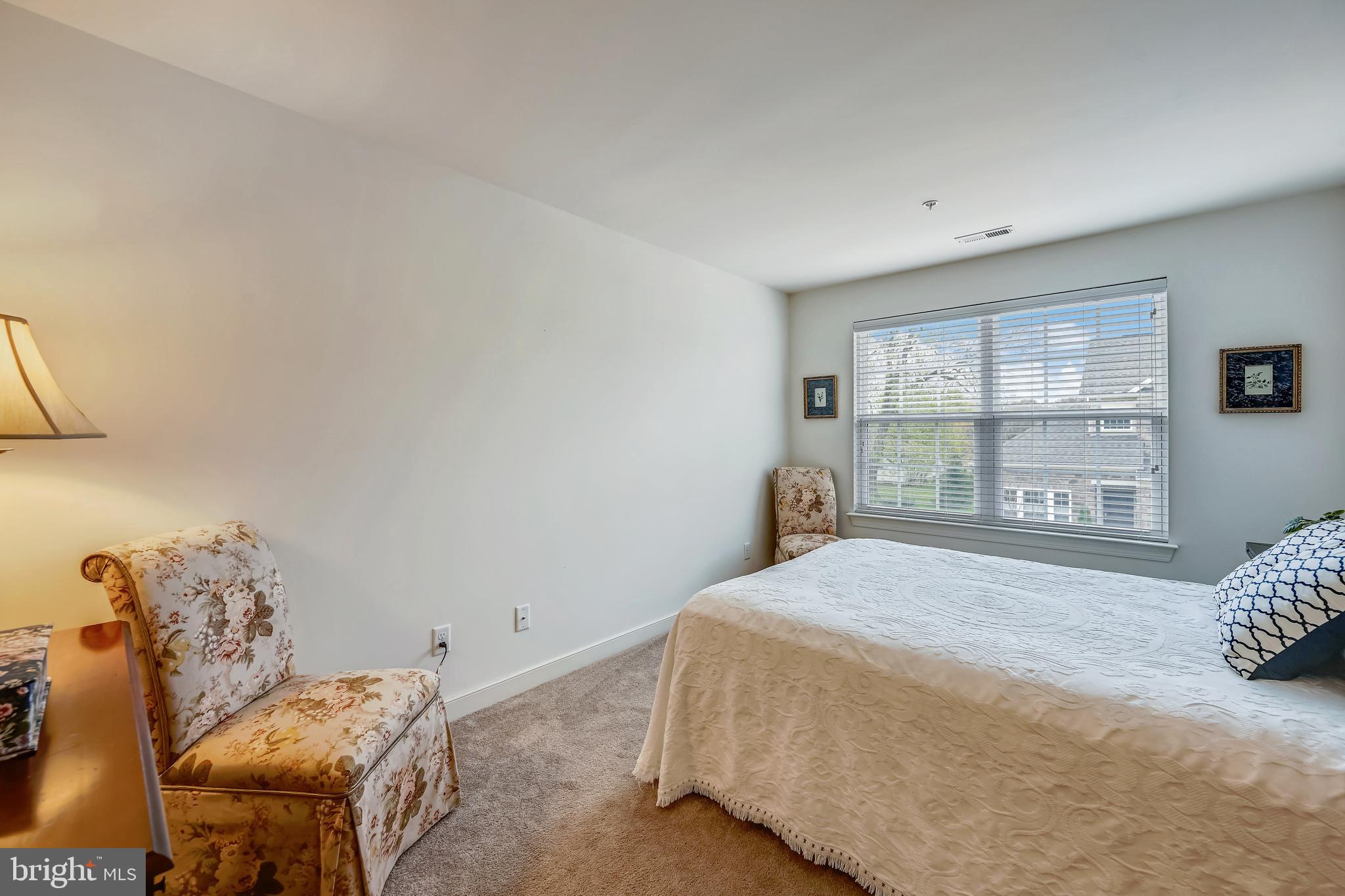 24 Trail Ride Drive, Unit 435 Taneytown, MD 21787 - Photo 27 of 61 LARGE BEDROOM #2 W/ NEUTRAL CARPET