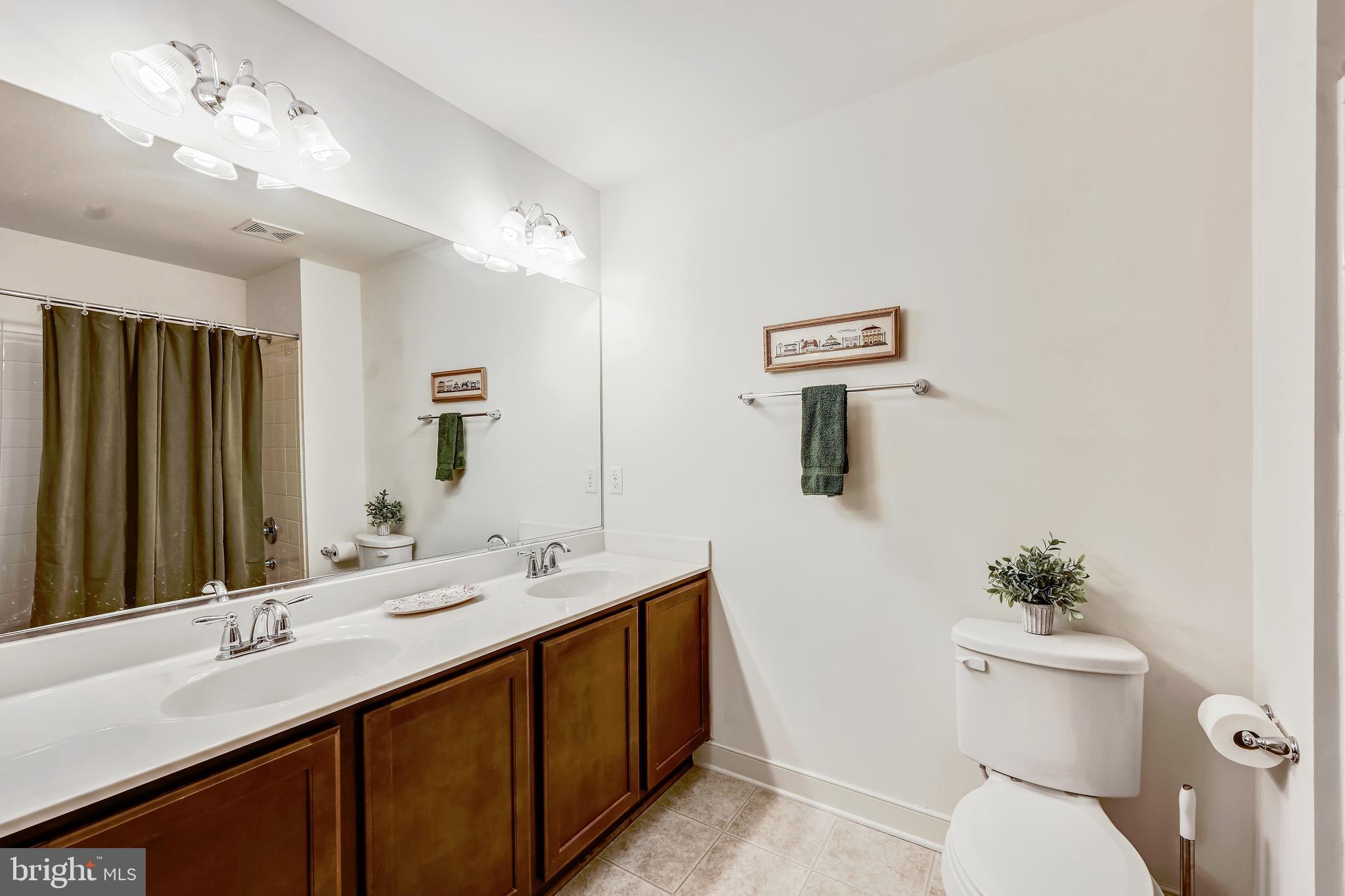 24 Trail Ride Drive, Unit 435 Taneytown, MD 21787 - Photo 32 of 61 UPPER LEVEL BTHRM W/ DUAL SINKS & TUB/SHOWER COMBO