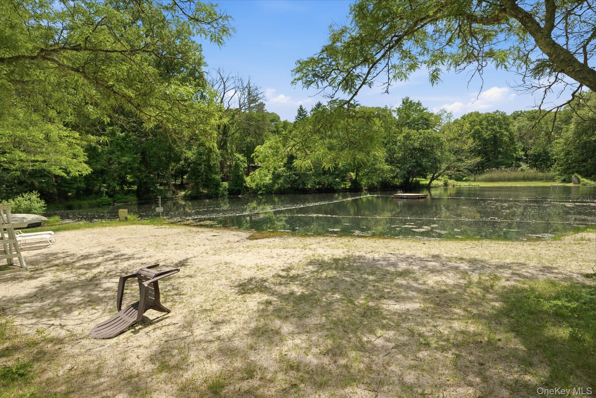 35 Deans Bridge Road Somers, NY 10589 - Photo 45 of 49 Tree-ringed and quiet, the members' Deans Pond opens up for swimming, fishing, and lazy afternoons drifting out to the dock, the kind of summer that feels like it belongs to another era.