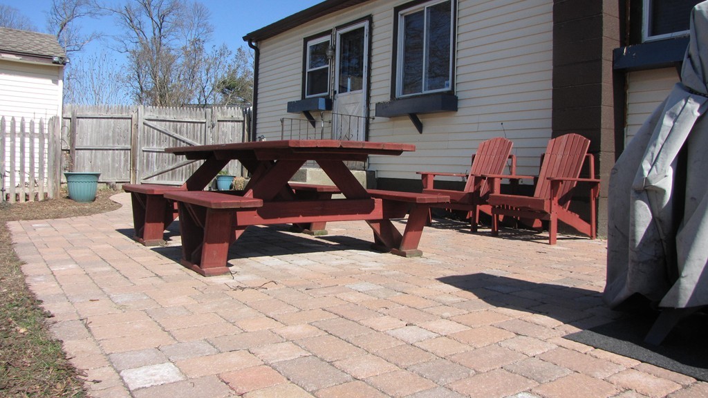 50 Rochford Circle Springfield, MA 01128 - Photo 4 of 23 a backyard of a house with outdoor seating