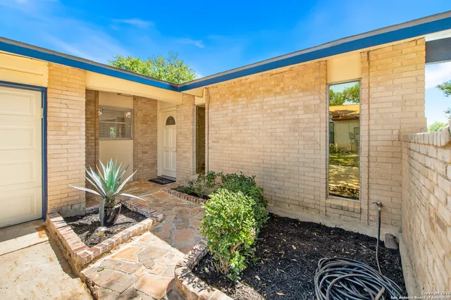 a view of balcony with potted plant
