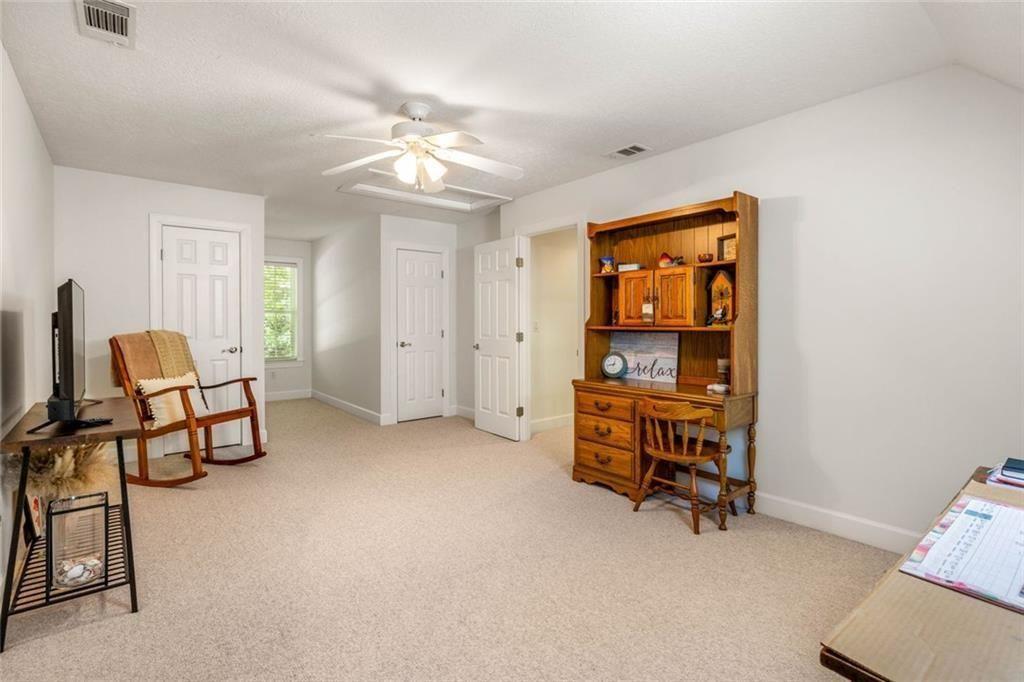 704 Riverbend Road Blairsville, GA 30512 - Photo 53 of 89 a view of a livingroom with furniture and closet area