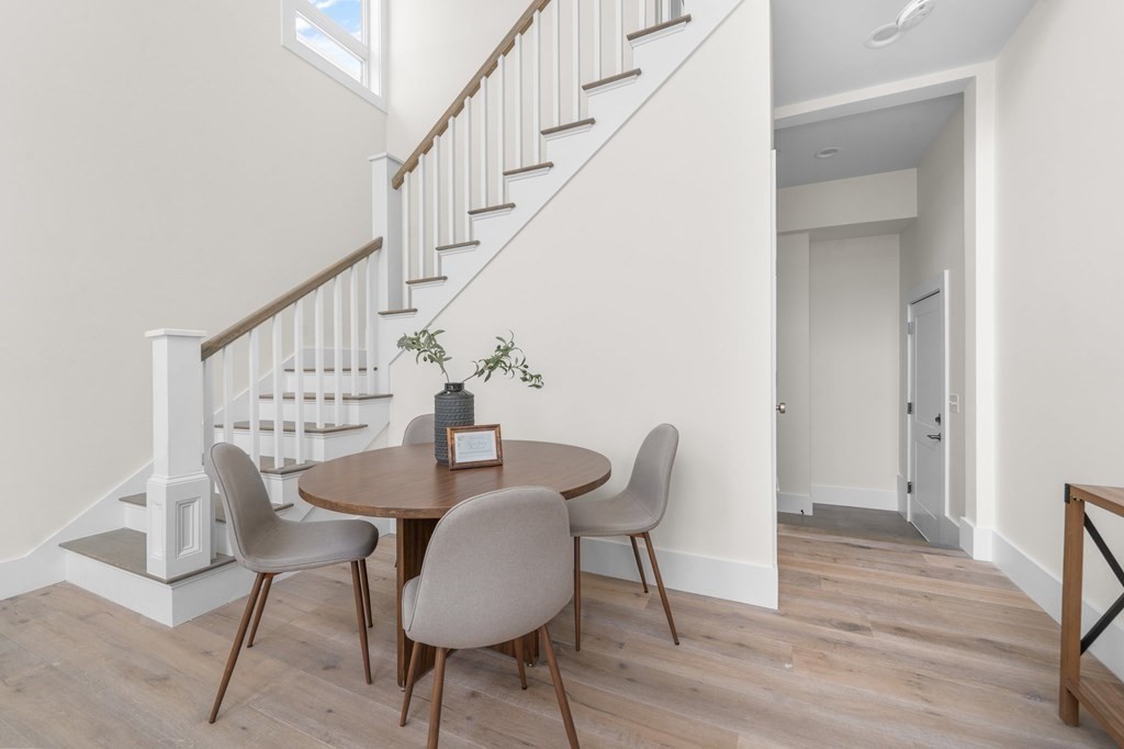 120 School Street, Unit 3 Boston, MA 02119 - Photo 12 of 30 a view of a dining room with furniture and wooden floor