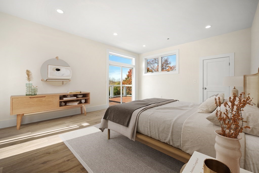 120 School Street, Unit 3 Boston, MA 02119 - Photo 14 of 30 a bedroom with a bed and a couch