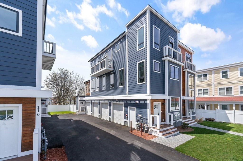 120 School Street, Unit 3 Boston, MA 02119 - Photo 23 of 30 a view of a building with a street