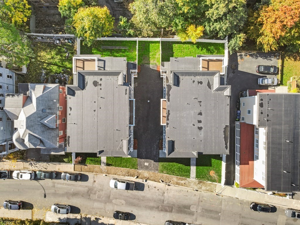 120 School Street, Unit 3 Boston, MA 02119 - Photo 30 of 30 a view of a house with a backyard