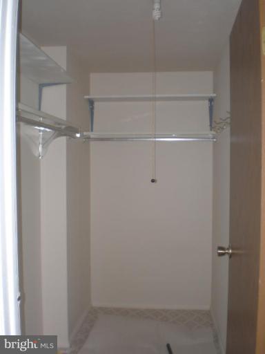 8182 Oakglen Road Manassas, VA 20110 - Photo 12 of 13 Master Bedroom Walk in Closet