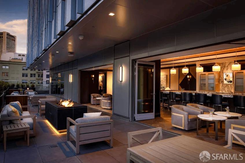 706 Mission Street, Unit 28A San Francisco, CA 94103 - Photo 13 of 30 a living room with furniture and large windows