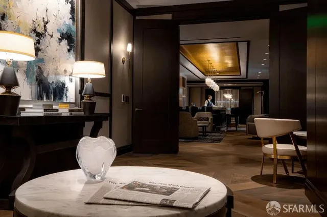 a dining room with table and chairs