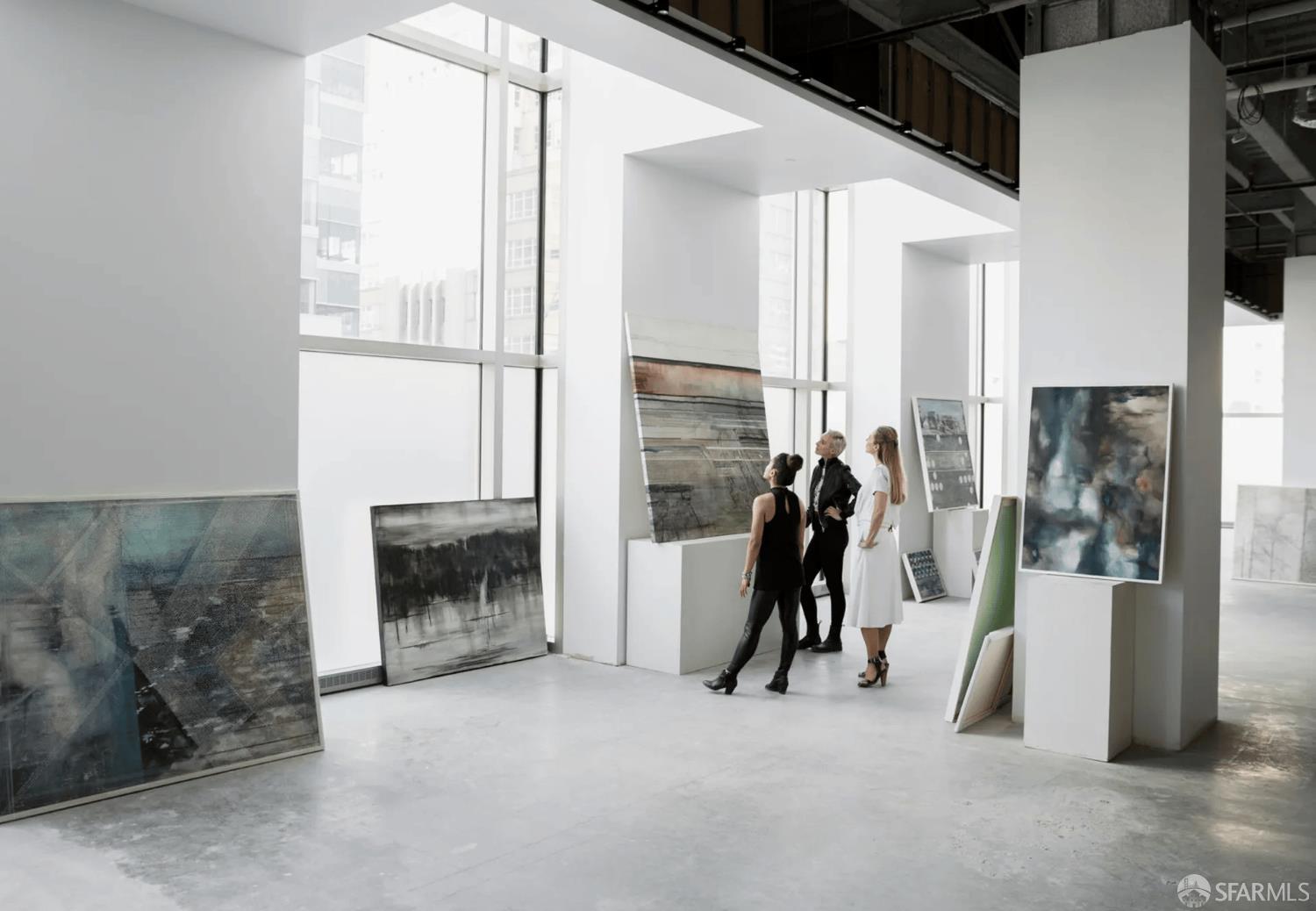 706 Mission Street, Unit 28A San Francisco, CA 94103 - Photo 17 of 30 a living room with furniture and a fireplace