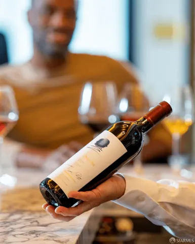 a bedroom with a bed and a lamp