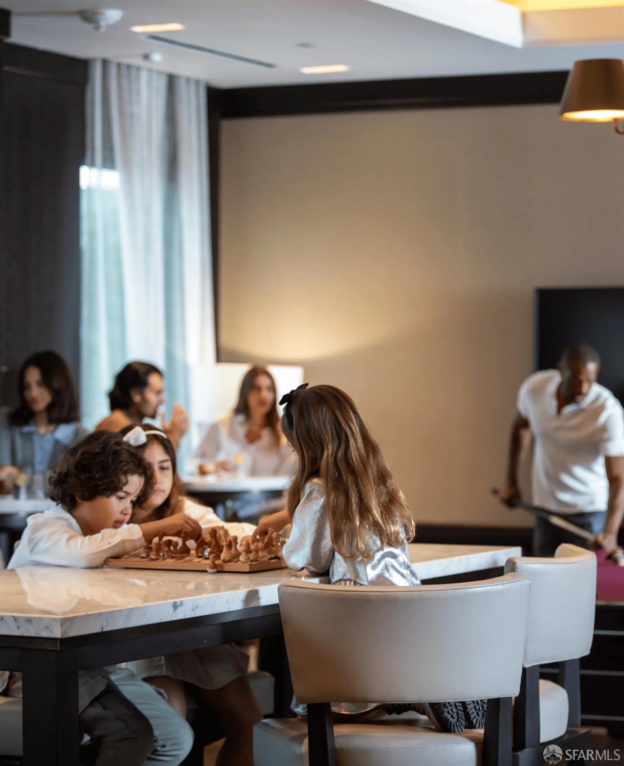 706 Mission Street, Unit 28A San Francisco, CA 94103 - Photo 22 of 30 a room with a table chairs and a dining table
