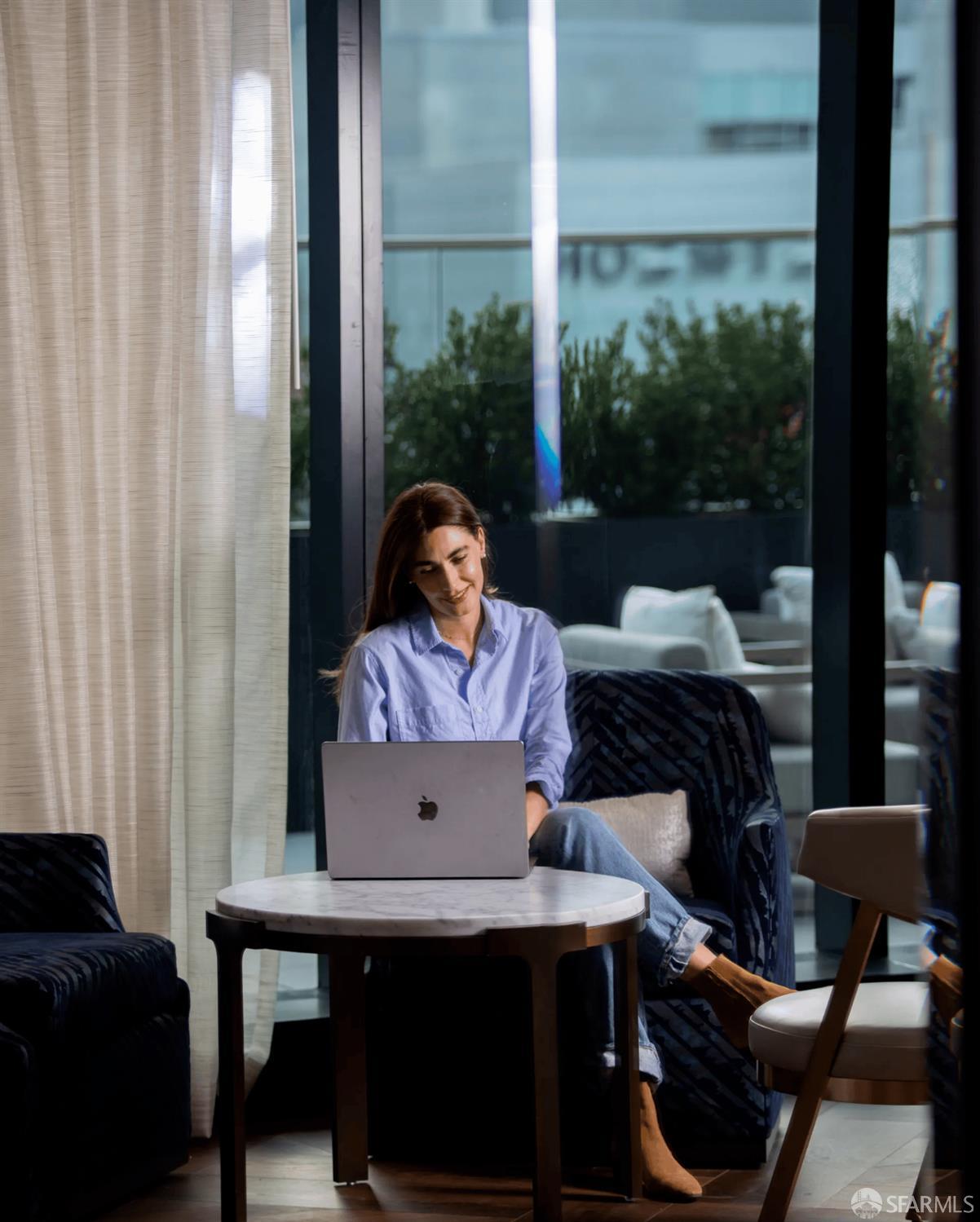 706 Mission Street, Unit 28A San Francisco, CA 94103 - Photo 24 of 30 a living room with furniture and a window