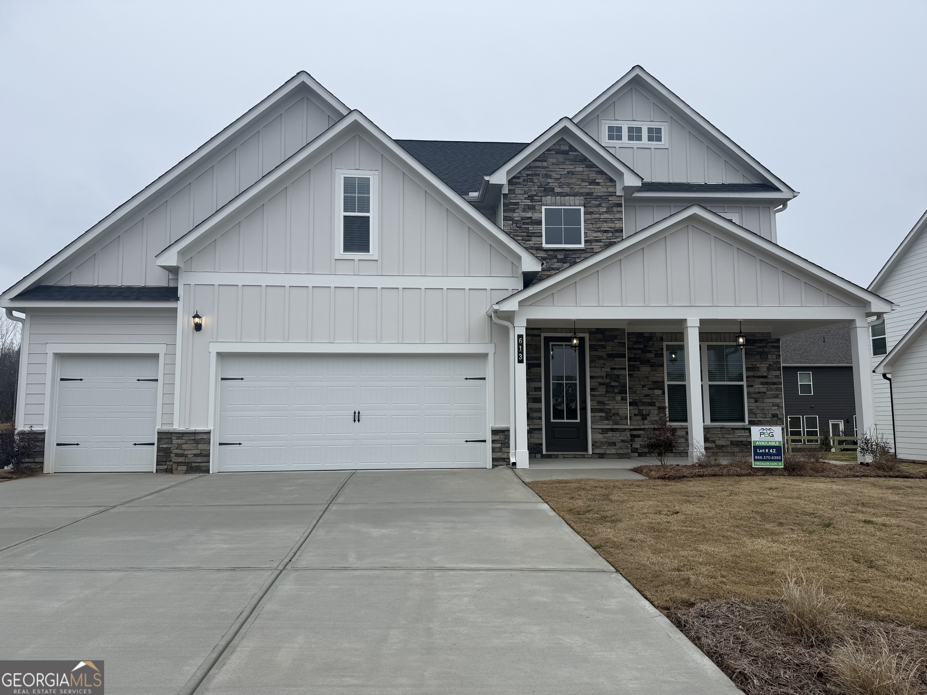 613 Villa Rica Springs Villa Rica, GA 30180 - Photo 2 of 14 a front view of a house with a garage