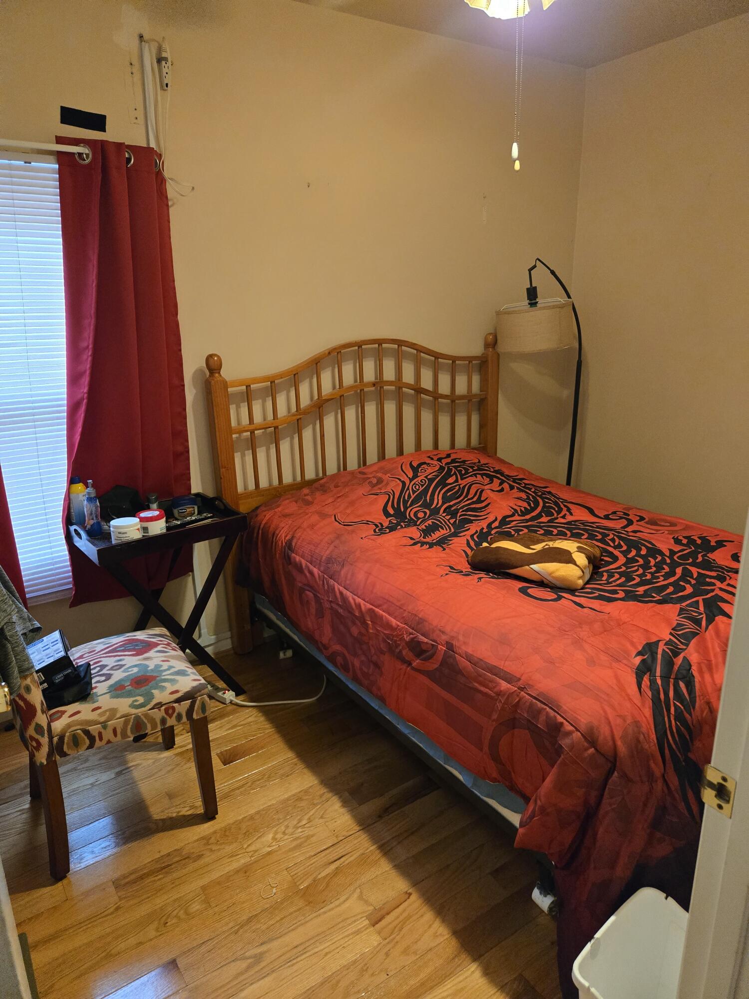 8146 Williamson Road Roanoke, VA 24019 - Photo 11 of 27 a bedroom with a bed and dresser