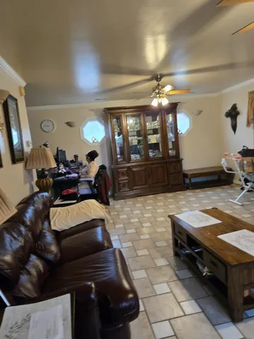 a bedroom with a bed and a night stand