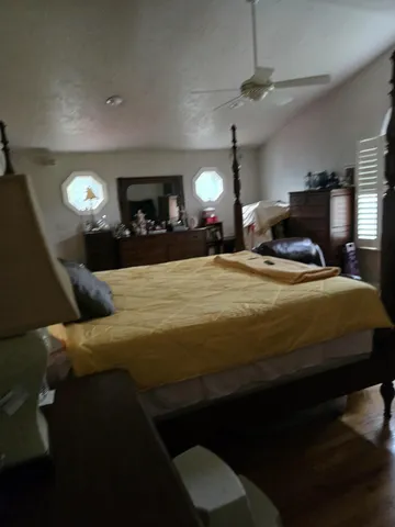 a view of a patio with table and chairs