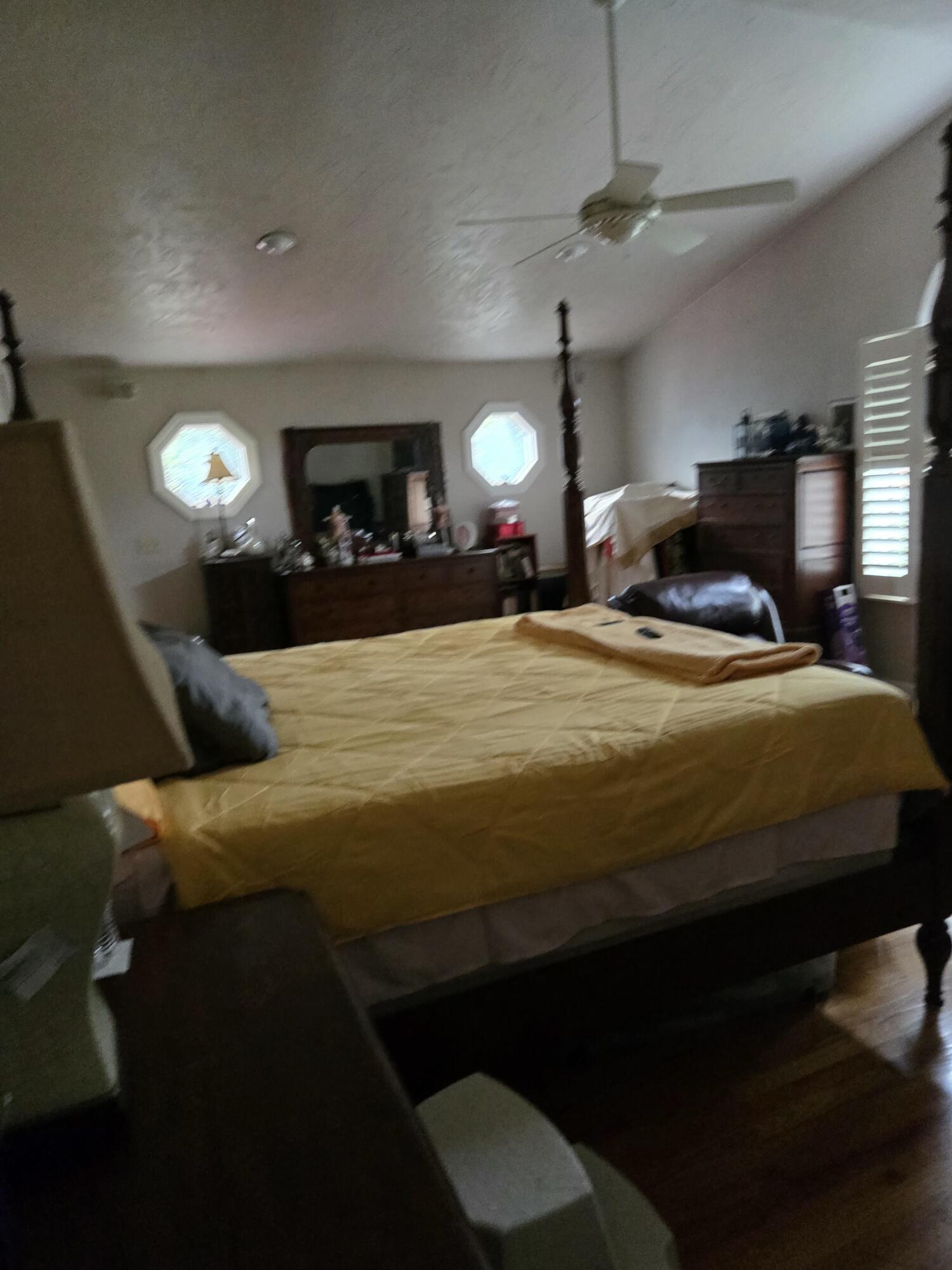 8146 Williamson Road Roanoke, VA 24019 - Photo 16 of 27 a bedroom with a bed and a night stand