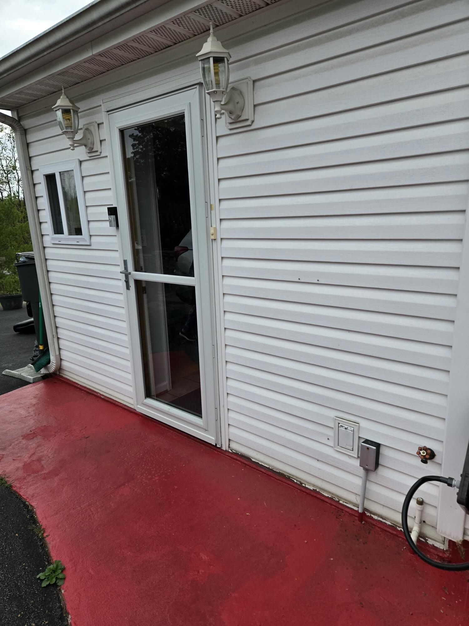8146 Williamson Road Roanoke, VA 24019 - Photo 19 of 27 a view of a patio with table and chairs