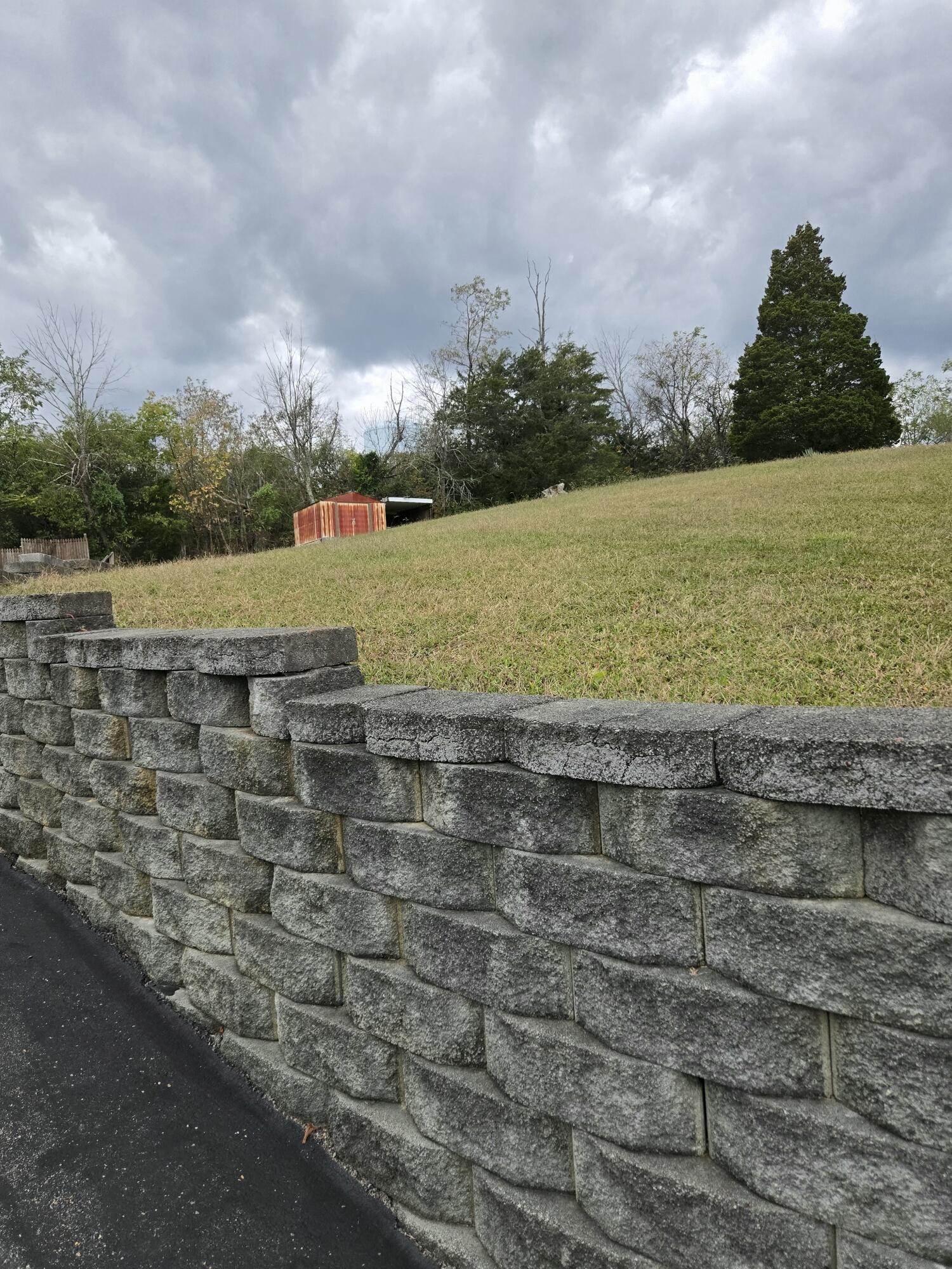 8146 Williamson Road Roanoke, VA 24019 - Photo 22 of 27 a view of a lake with a building in the background