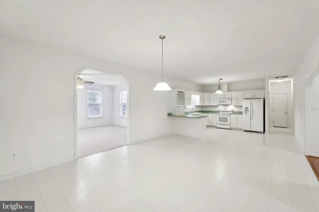 a view of a kitchen with a sink