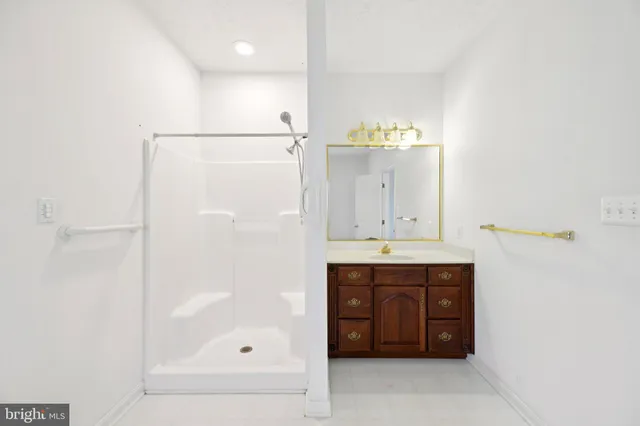 a bathroom with a bathtub and a sink