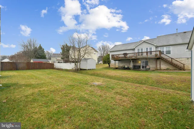 a view of a house with a big yard