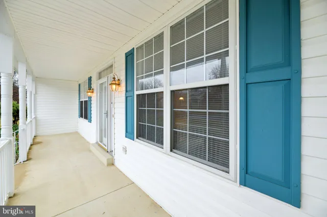 a view of a house with a large window