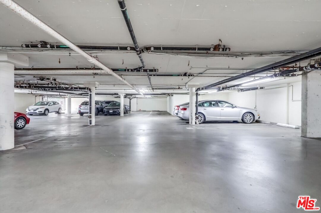 3734 South Canfield Avenue, Unit 331 Los Angeles, CA 90034 - Photo 43 of 45 a view of parking garage with cars