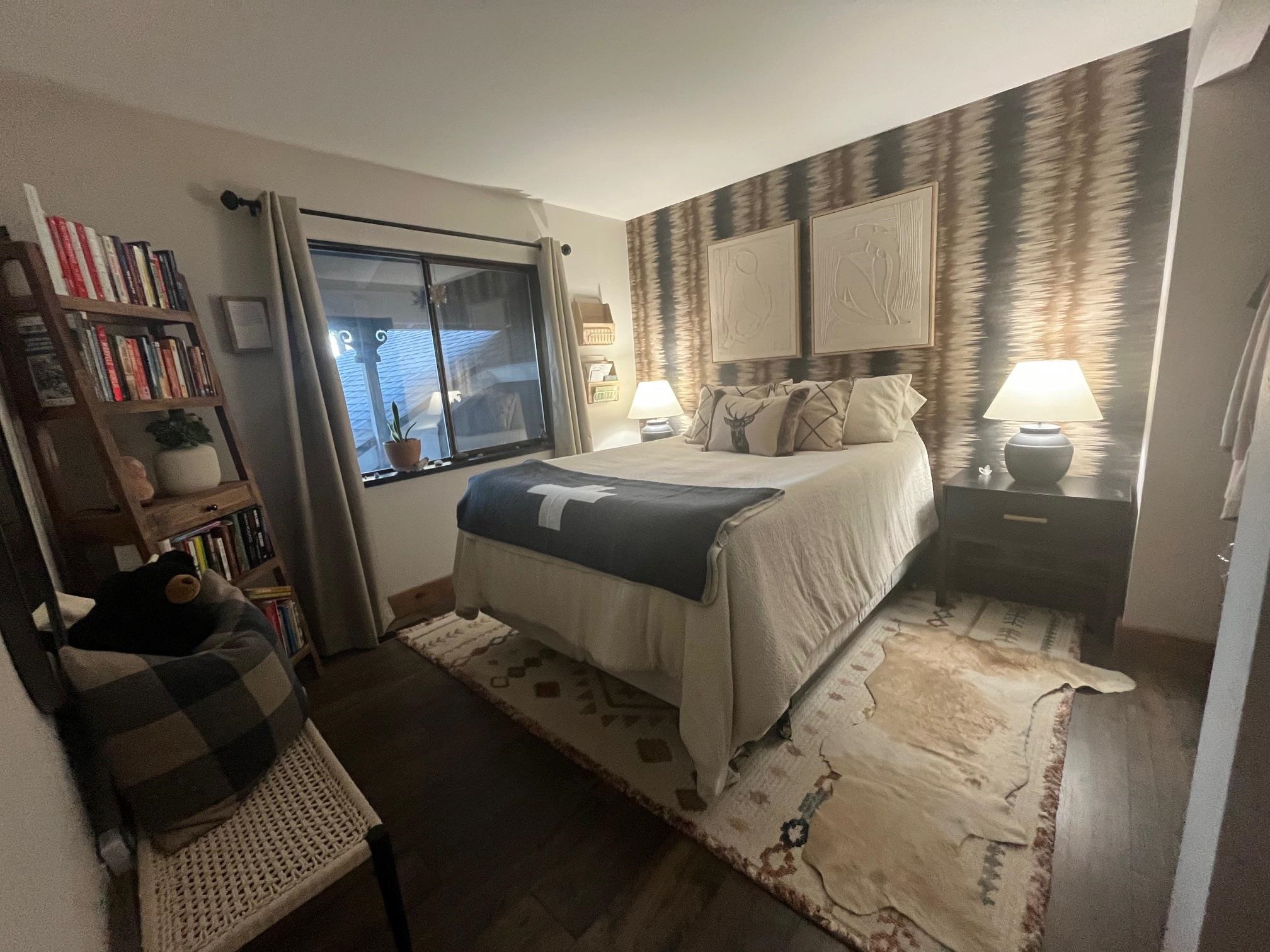 14567 Royal Way Truckee, CA 96161 - Photo 4 of 8 a bedroom with a bed window and a mirror